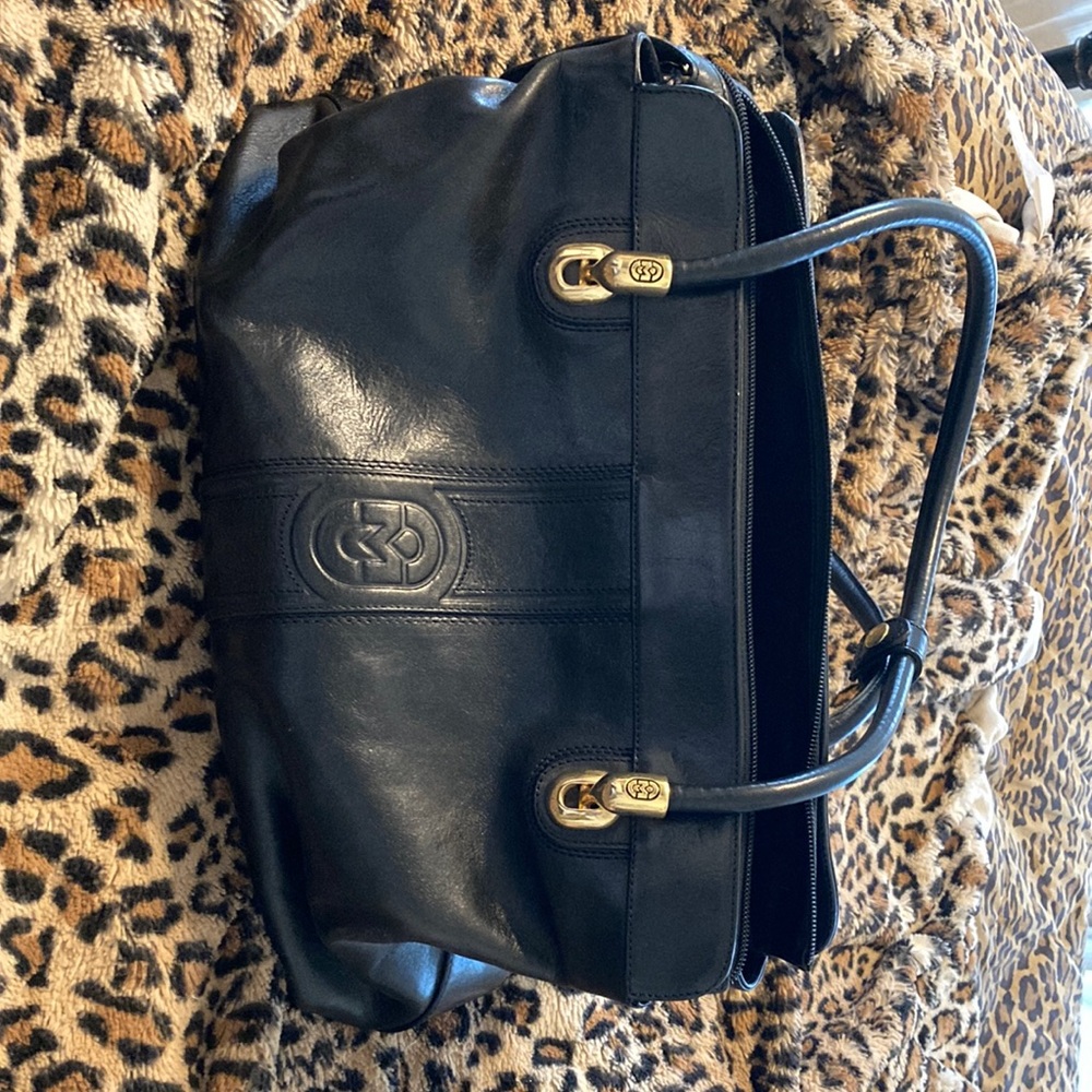 Gorgeous vintage black leather Marino Orlandi satchel. EUC. Exterior zip pocket.